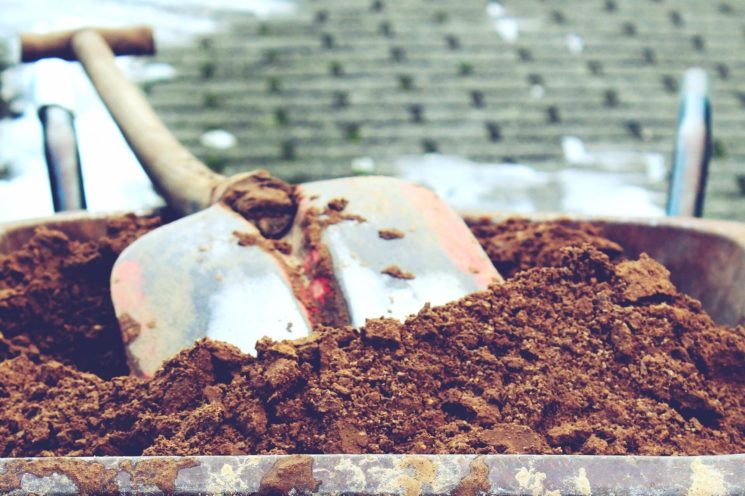 Shovel dirt and wheelbarrow