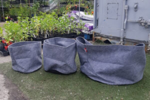 Grey root pro bag line up. 5, 10 and 30 gallon sizes displayed.