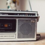 Silver and grey close up of retro radio player.